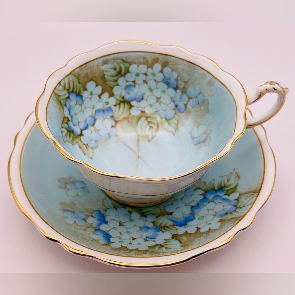 Paragon teacup and saucer, blue with blue hydrangeas, double warrant, gold trim